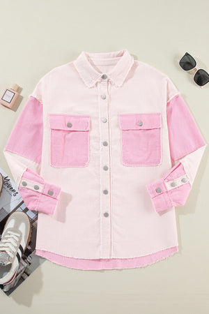 Colorblock corduroy shacket in blush pink with raw edges and buttoned chest pockets.