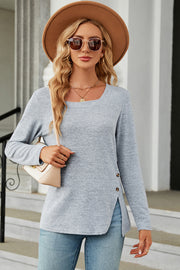 Light blue asymmetric top with square neck and button detail on side slit