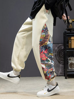 Men's off white joggers with bold side panel print and elastic cuffs