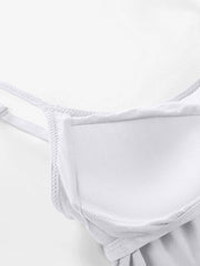 White soft-cup cami with adjustable straps and detailed stitching