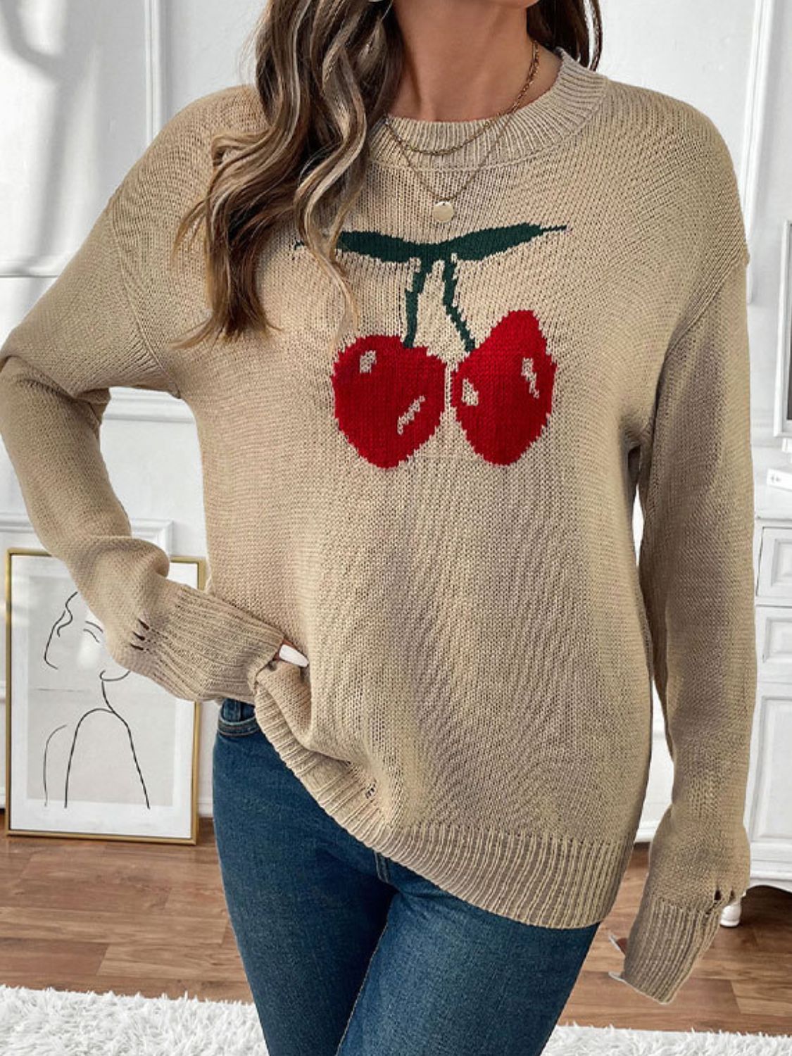 Khaki acrylic knit jumper with a red cherry motif, crew neck, and long sleeves.