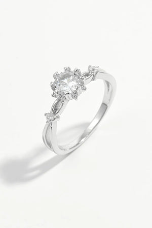 Silver halo ring with floral zirconia accents