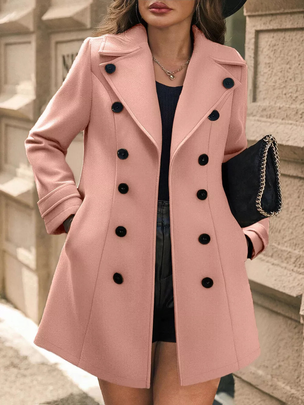 Pale Blush double-breasted wool blend trench coat with black buttons and cuffed sleeves.