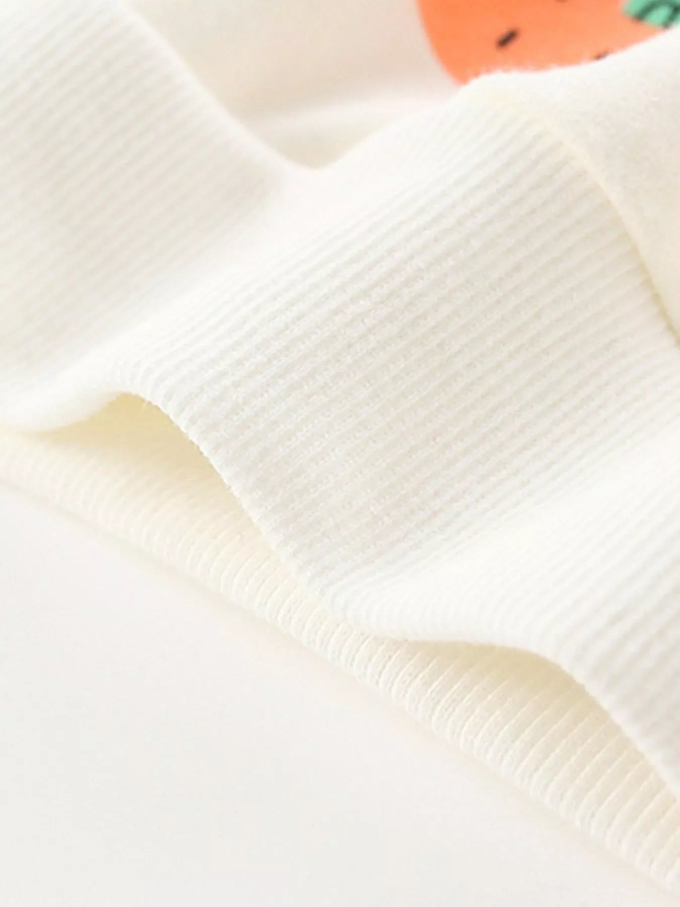 Children's cream cotton blend crew neck sweatshirt with ribbed texture detail.