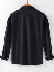 Men's black long sleeve button-up shirt with cuffed sleeves.