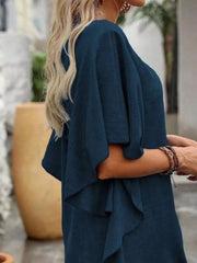 Dark navy ruffled sleeve V-neck mini dress with layered details.