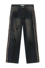 Distressed wide-leg jeans in dark wash denim with frayed trim and a relaxed fit.