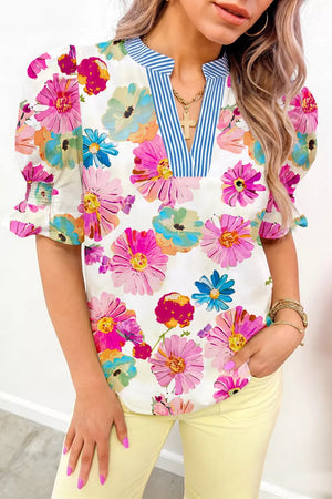 Vibrant floral print cotton blouse with V-neck and puff sleeves