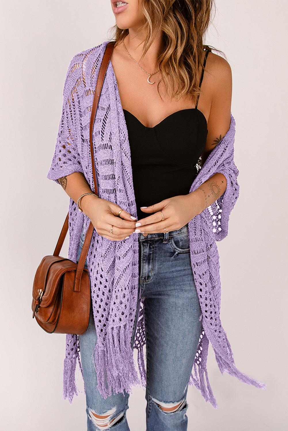 Lavender open knit chevron fringe cardigan with short sleeves and a boho vibe.
