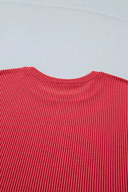 Red twisted rib t-shirt with crew neck and vertical stripe texture.