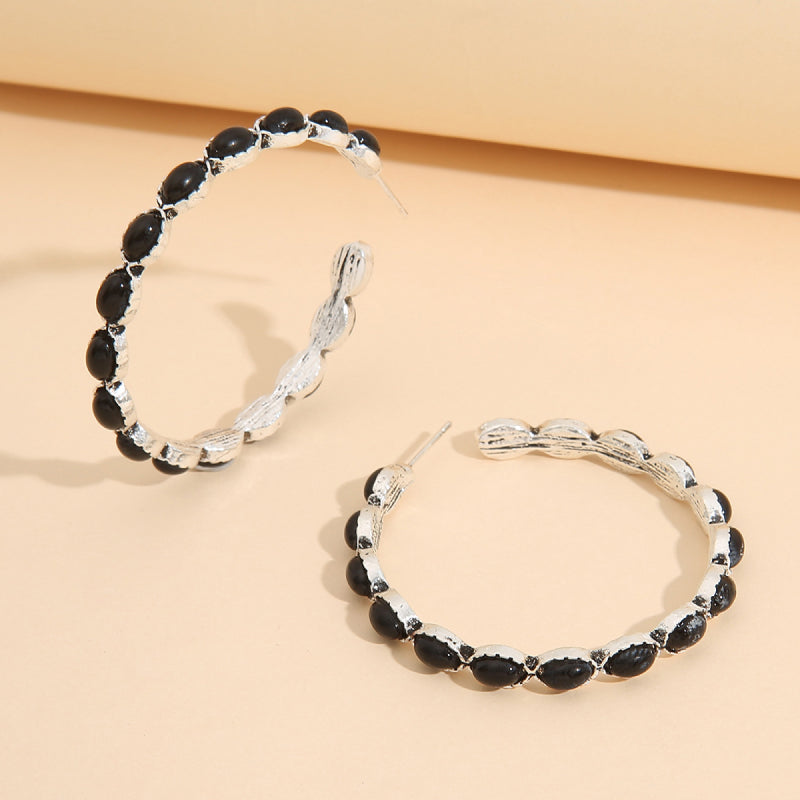 Textured black stone hoop earrings with silver-tone alloy setting