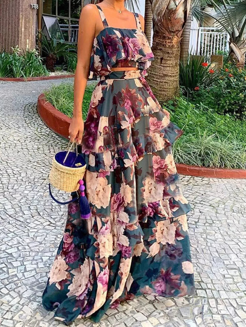 Ruffled floral two-piece set with tiered skirt and crop top in dark floral print.