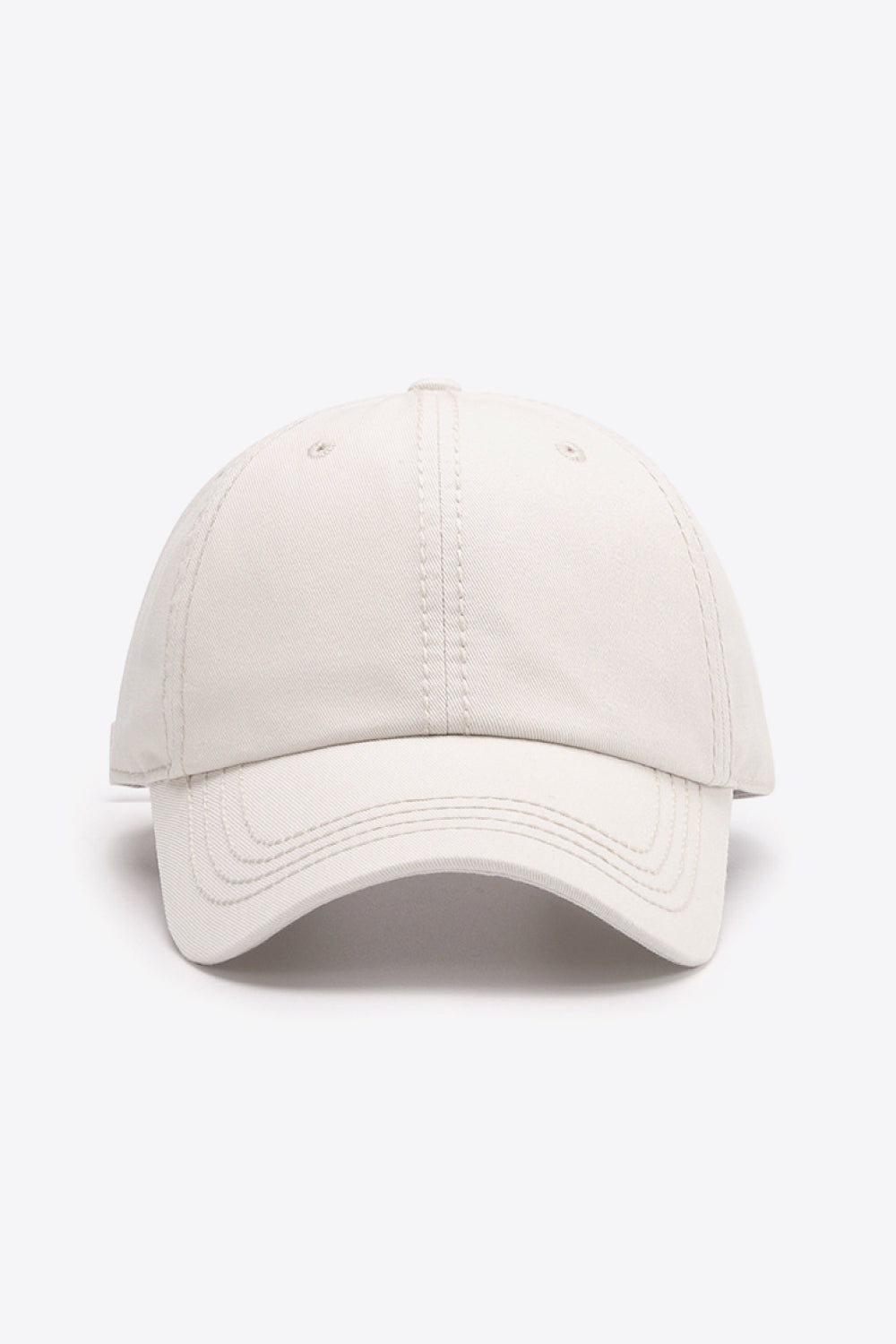 Beige canvas baseball cap with curved brim and stitched details