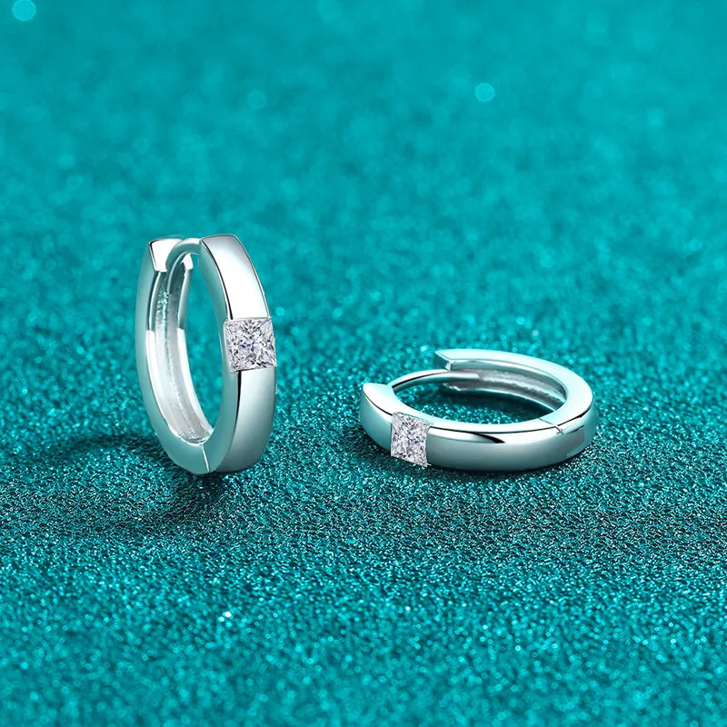 Square moissanite silver hoop earrings with princess-cut stones.