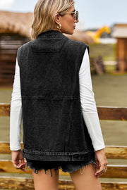 Sleeveless dark denim utility vest with buttoned front and frayed hem.