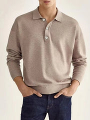 Relaxed knit polo shirt in taupe with buttoned placket and long sleeves.