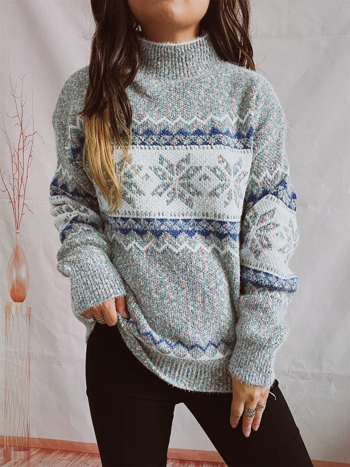 Geometric knit mockneck pullover in Cloudy Blue with fair isle pattern and acrylic blend.