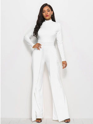 White high-waisted palazzo jumpsuit with slit front and long sleeves.