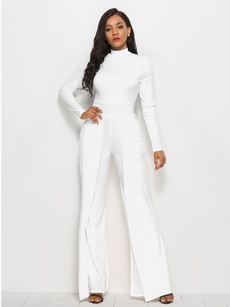 White high-waisted palazzo jumpsuit with slit front and long sleeves.