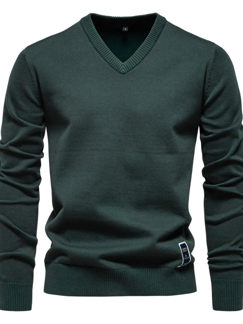 Essential V-neck ribbed knit sweater in Peacock Blue with a ribbed hem and cuffs.