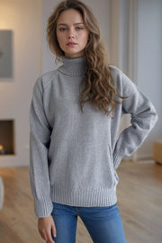 Gray speckled Donegal turtleneck pullover sweater with ribbed cuffs and hem