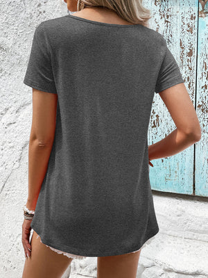 Dark gray t-shirt with short sleeves and a rounded neckline, featuring a floral lace yoke detail.