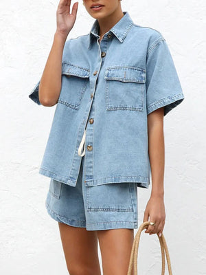 Light wash denim co-ord set with short sleeve button-up shirt and shorts.