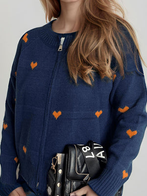 Dark blue knit zip-through cardigan with orange heart appliqué and crew neck.