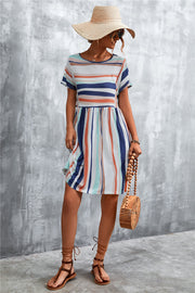 Striped trapeze dress with short sleeves and yoke seam detail, in multi-color stripes.