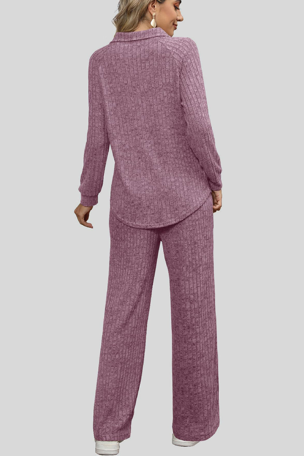 Mauve ribbed knit lounge set with collar and wide leg pants.