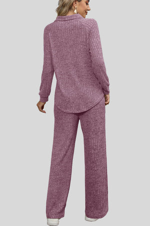 Mauve ribbed knit lounge set with collar and wide leg pants.