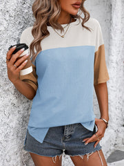 Colorblock t-shirt with white, blue, and camel sleeves and waffle knit texture.