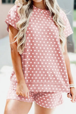 Pink polka dot tee and shorts set with short sleeves and elastic waistband.