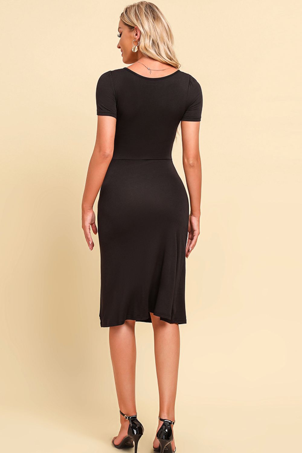 Black ruched bust midi dress with short sleeves and thigh slit