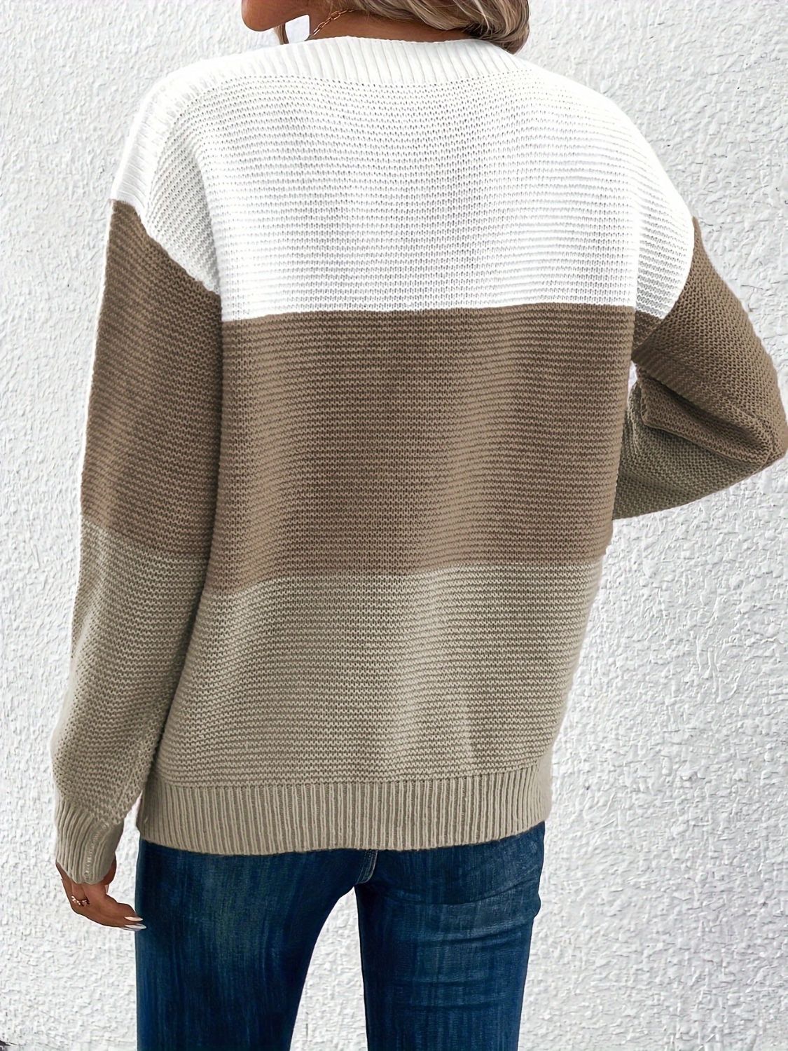 Colorblock ribbed knit sweater with boatneck, featuring white, taupe, and light gray stripes.