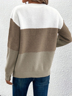 Colorblock ribbed knit sweater with boatneck, featuring white, taupe, and light gray stripes.