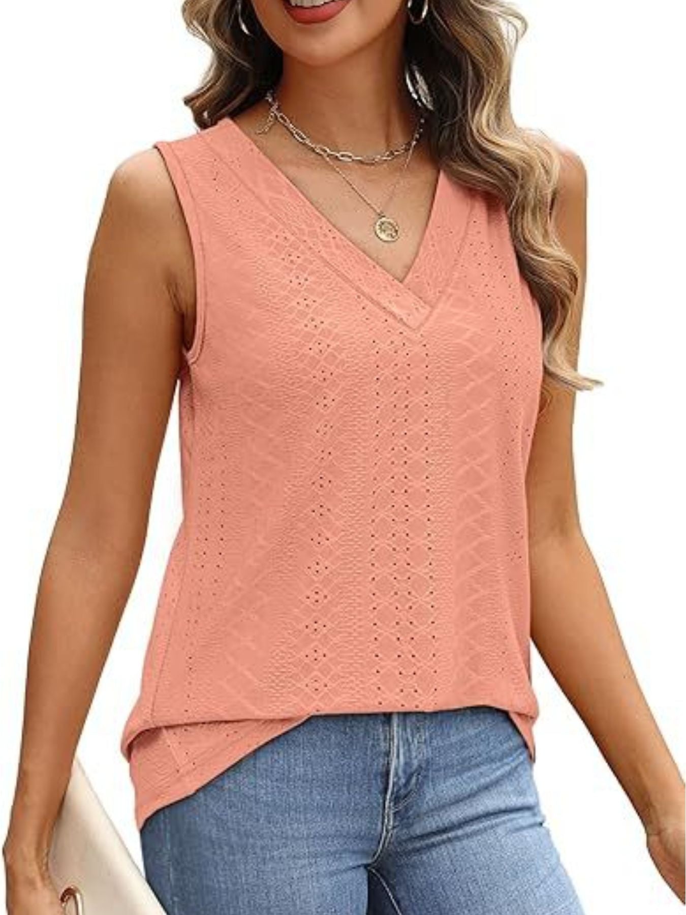 Eyelet V-neck sleeveless tank top in watermelon pink with textured pattern.