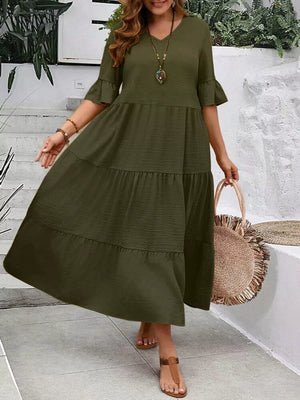 Army green crinkled midi dress with ruffle sleeves and tiered skirt.