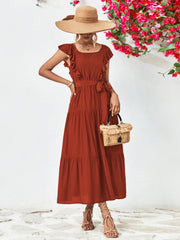 Brick red flutter sleeve tiered midi dress with square neckline and belt.