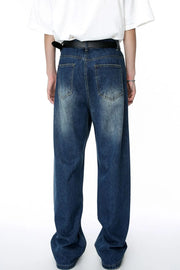Baggy denim jeans in medium wash with distressed details and a relaxed fit.