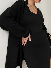 Black ribbed knit co-ord set with a V-neck tank and long cardigan with pockets.