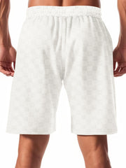 Men's white checkered drawstring chino shorts with elastic waistband.
