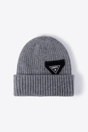 Happy Patch Ribbed Beanie in Steel acrylic with a black triangle patch.