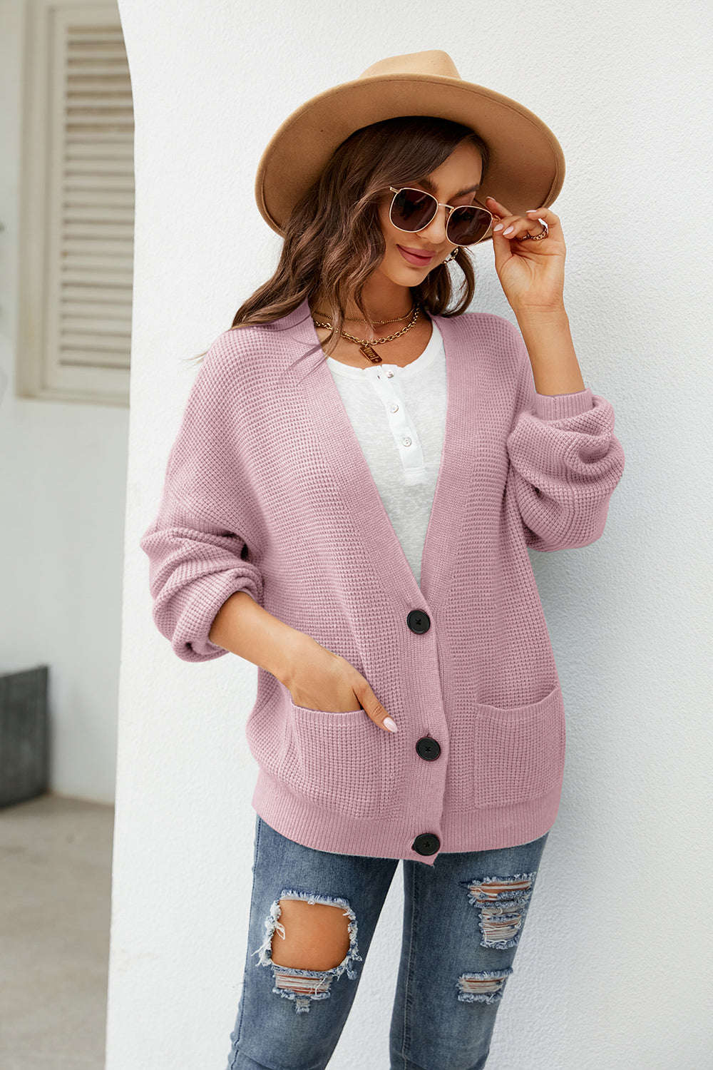 Waffle knit oversized cardigan in carnation pink with button front and pockets.