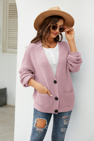 Waffle knit oversized cardigan in carnation pink with button front and pockets.
