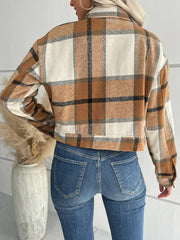 Checked plaid shacket in brown and cream with button closure and patch pockets.