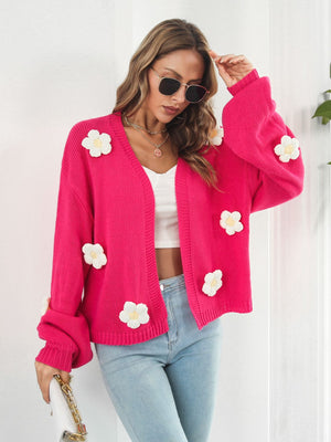Hot Pink knit cardigan with floral appliqués and balloon sleeves.