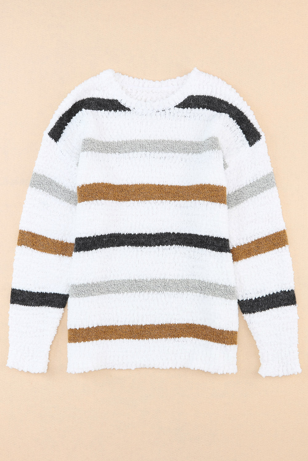 Textured stripe slouchy knit sweater in white with brown, grey, and black stripes.