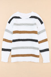 Textured stripe slouchy knit sweater in white with brown, grey, and black stripes.