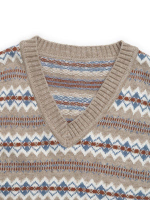 Geometric knit v-neck vest in mocha with fair isle pattern and ribbed trim.